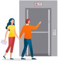 Couple enters modern elevator with iron doors. Passengers walk into lift, transporting device Royalty Free Stock Photo