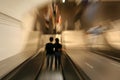 Couple on Escalator Royalty Free Stock Photo