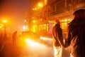 Couple european holding hands together on the night street market at Sa Pa, Vietnam