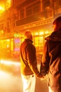 Couple european holding hands together on the night street market at Sa Pa, Vietnam