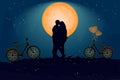 Couple in evening under the orange moon in love atmosphere. Valentine`s day card with romantic couple and bike. Royalty Free Stock Photo