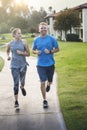 Couple exercising and jogging together at the park Royalty Free Stock Photo