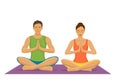 Couple exercising yoga together, meditating in lotus pose