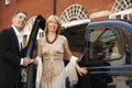 Couple Exiting London Taxi Royalty Free Stock Photo