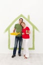 Couple expecting a baby redecorating their home Royalty Free Stock Photo