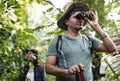 Couple exploring a forest together Royalty Free Stock Photo