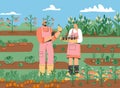 Couple of farmers standing in vegetable garden Royalty Free Stock Photo