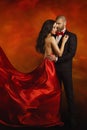 Couple Fashion Portrait, Elegant Man and Woman in Red Dress Royalty Free Stock Photo