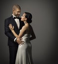 Couple Fashion Portrait, Embracing Man in Suit and Woman in Dress Royalty Free Stock Photo