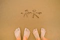 Couple feet on beach Royalty Free Stock Photo