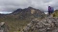 Couple of female climbers admiring the Rucu Pichincha volcano