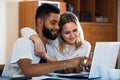 Couple filling document online
