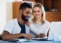 Couple filling document online