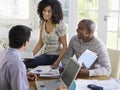 Couple With Financial Advisor At Table Royalty Free Stock Photo