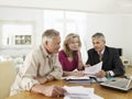 Couple With Financial Advisor At Table Royalty Free Stock Photo