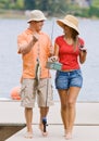 Couple fishing on pier Royalty Free Stock Photo