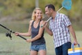 Couple fishing on pier Royalty Free Stock Photo