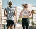 Couple, fitness and running back together in the city for exercise, workout or cardio routine in Cape Town. Active man Royalty Free Stock Photo