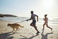 Couple, fitness or running with dog on beach exercise, training or workout by water waves, ocean or California sea with Royalty Free Stock Photo