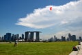 Couple flying kite infront of Marina Bay Sands, Singapore