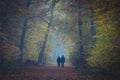 Couple in foggy forest