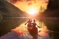 Couple friends canoeing on a wooden canoe Royalty Free Stock Photo