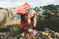 Couple friends giving five hands reached mountain top