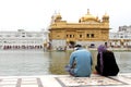 Couple in front of Golden Temple, Amritsar, Punjab, India