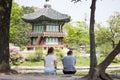 Couple front of Korean Palace, Gyeongbokgung Pavilion, Seoul, South Korea