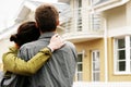 Couple in front of one-family house Royalty Free Stock Photo