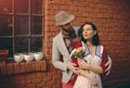 Couple in front of the red brick house Royalty Free Stock Photo