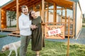 Couple in front of their new house Royalty Free Stock Photo