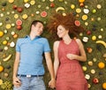 Couple with fruit Royalty Free Stock Photo