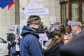 Couple with gas masks in protest for extreme air pollution, in front of the Ministry of Environment building, in Bucharest Royalty Free Stock Photo