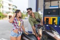 Couple On Gas Station Man Fuel Motor Bike, Happy Smiling Hispanic Guy