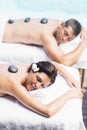 Couple getting a hot stone massage Royalty Free Stock Photo