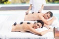 Couple getting a hot stone massage Royalty Free Stock Photo