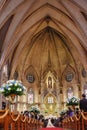 Couple getting married in a beautiful gothic church