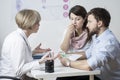 Couple giving a bribe Royalty Free Stock Photo