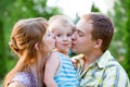 Couple giving and children outdoors