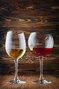 Couple glasses with red and white wine for tasting Royalty Free Stock Photo