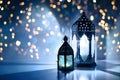 Couple of glowing Moroccan ornamental lanterns on the table. Greeting card, invitation for Muslim holy month Ramadan Royalty Free Stock Photo