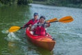 The couple goes kayaking on the river. Royalty Free Stock Photo