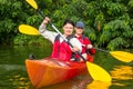 The couple goes kayaking on the river. Royalty Free Stock Photo