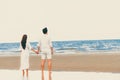 Couple going honeymoon on tropical beach in summer Royalty Free Stock Photo