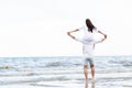 Couple going honeymoon on tropical beach in summer