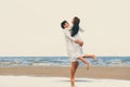 Couple going honeymoon on tropical beach in summer Royalty Free Stock Photo