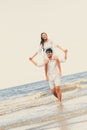 Couple going honeymoon on tropical beach in summer Royalty Free Stock Photo