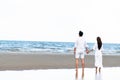 Couple going honeymoon on tropical beach in summer Royalty Free Stock Photo