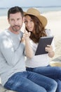 couple before going in sail boat using tablet Royalty Free Stock Photo